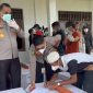 Proses penyerahan jenazah pendulang emas korban pembantaian KKB di Kabupaten Yahukimo, Papua Pegunungan, Senin 14 April 2025. (Satgas Damai Cartenz)