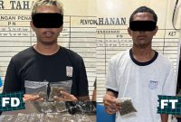 Dua pelaku penyelundupan ganja di Pelabuhan Jayapura. (Foto: Humas Polresta Jayapura Kota)