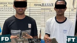 Dua pelaku penyelundupan ganja di Pelabuhan Jayapura. (Foto: Humas Polresta Jayapura Kota)