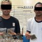 Dua pelaku penyelundupan ganja di Pelabuhan Jayapura. (Foto: Humas Polresta Jayapura Kota)